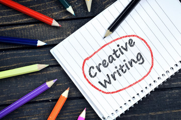 Creative Writing text on notepad