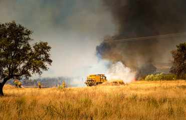 Firefighters  fighting fire.