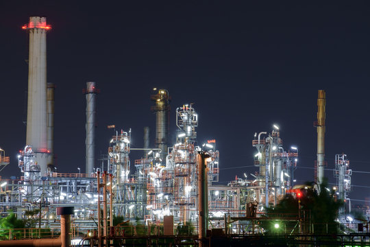 Oil refinery / View of oil refinery at night.