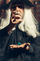 Old wizard pendant for hypnosis