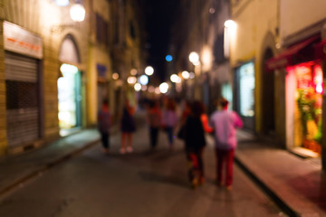 out of focus picture of a night scene in Florence