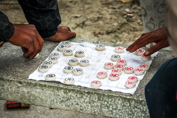 Obraz premium Traditional Chinese Chess game played on paper
