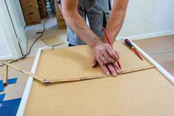 joiner measuring an cabinet