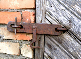 Old lock on the door. true village style .