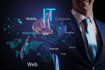 Businessman in suit working with virtual screen. IT technologies concept.