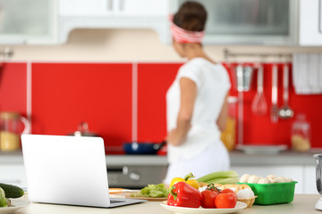 Girl cooking on kitchen. Food blogger concept