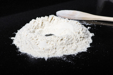 Flour being formed into pasta