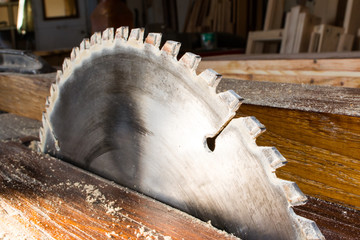 Circular saw in carpenter workshop