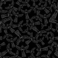 Obraz premium Angels on black background. Seamless pattern of white angels. For design of covers, printing on fabric or paper