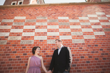 Bride and groom in an old town - wedding couple