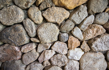 The stone wall close up as background