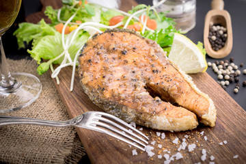 salmon steak with vegetables
