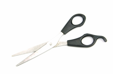 Large dressmaking or tailoring scissors white background.