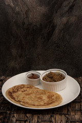 Roti Canai with chicken curry, sambal paste and 2 pieces of roti