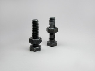 black bolts with the nuts