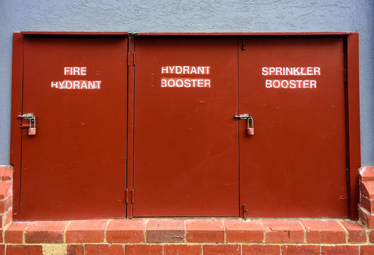 3 red fire equipment doors