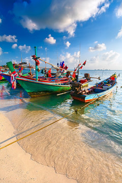 Thai traditional Fishing boat decorated with colorful ribbons