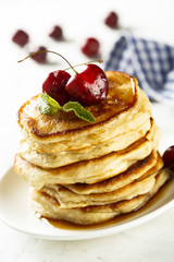 Pancakes with fresh cherry