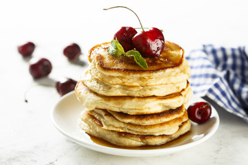 Pancakes with fresh cherry