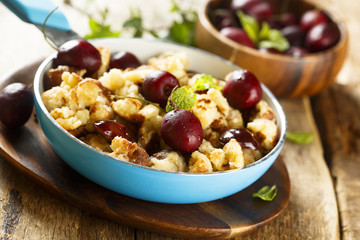 Austrian pancake dessert with cherries