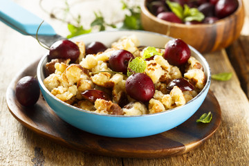 Austrian pancake dessert with cherries
