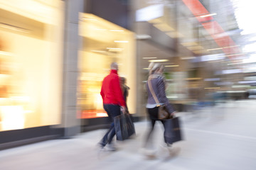 Blurred mall, people walking, zoom effect