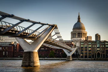 Foto auf Acrylglas Monument St. Paul's Cathedral and Millennium Bridge, officially known as the London Millennium Footbridge, across the river Thames