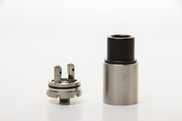 Dismantled parts of the electronic cigarette on a white backgrou