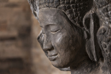 Buddha head in the East Mebon temple, Angkor, Cambodia