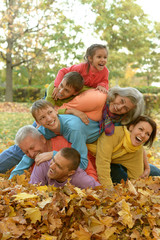 Fototapeta premium Happy family in autumn forest