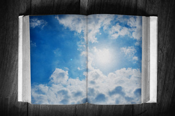 Grunge paper book and summer sky