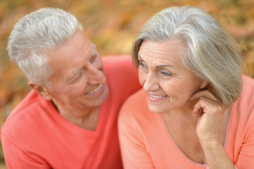 Senior couple in autumn park