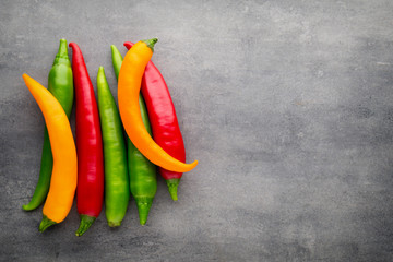 Chilli pepper on the grey background.