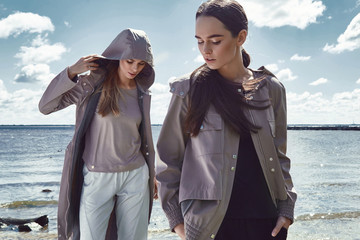 Beautiful sexy girl walk in rock stone beach ocean sea summer