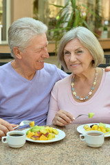 Senior couple having breakfast