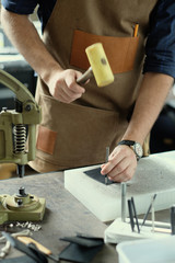 Leather workshop owner