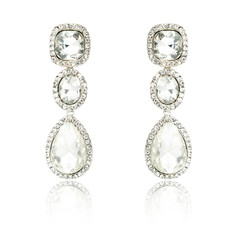 Pair of silver diamond earrings isolated on white