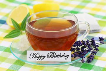 Happy Birthday card with cup of tea and lavender flowers
