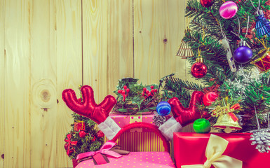 christmas ornaments on wood background.