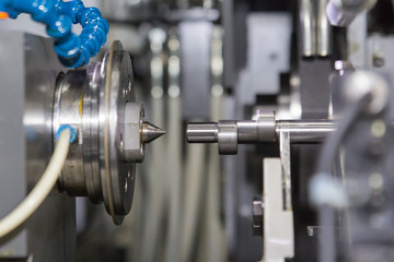 Detail of industrial machine working in workshop