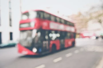 Foto op Plexiglas Blurred Red Bus in London England © bbourdages
