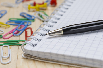 Fototapeta premium school supplies on a wooden desk