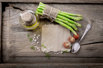 Fresh green asparagus with tomatoes and sea salt