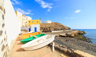 Obraz premium Wooden fishing boats in a small port in El Tarajalejo in Canary Islands