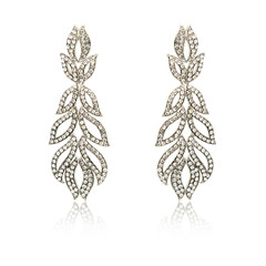 Pair of silver diamond earrings isolated on white