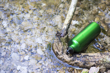 Bottle water on river mountain, trekking