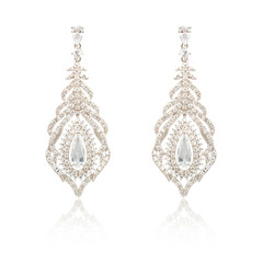 Pair of silver diamond earrings isolated on white