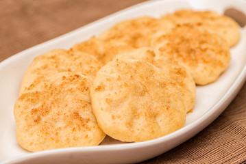 Vegan Butter and Cinnamon cookies on a white plate
