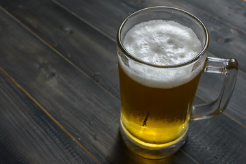 glass beer on wooden