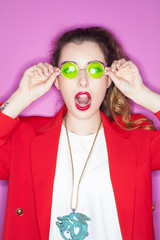 fashionable young model posing with trendy clothes